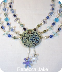 Close-up of necklace by Rebecca