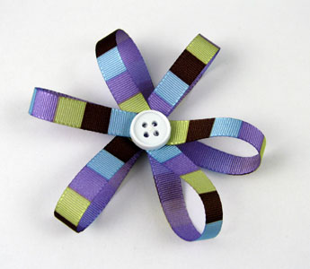 Bow made of ribbon and button